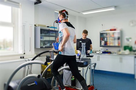 Man running on a treadmill in the exercise psychology laboratory