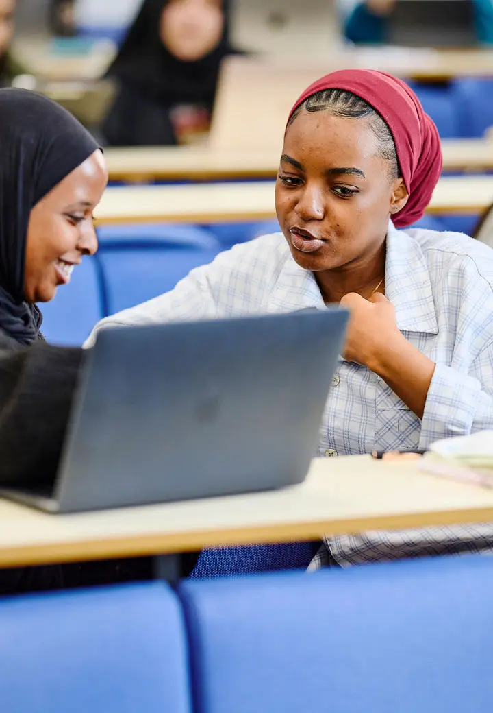 2 female students in class