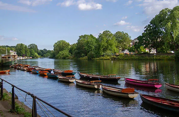 Richmond River in the sunshine with boats on the water.