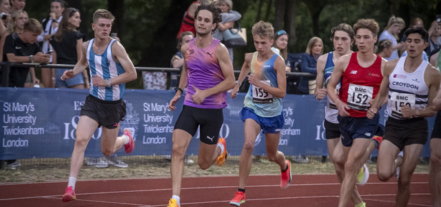 Runners on the athletics track.