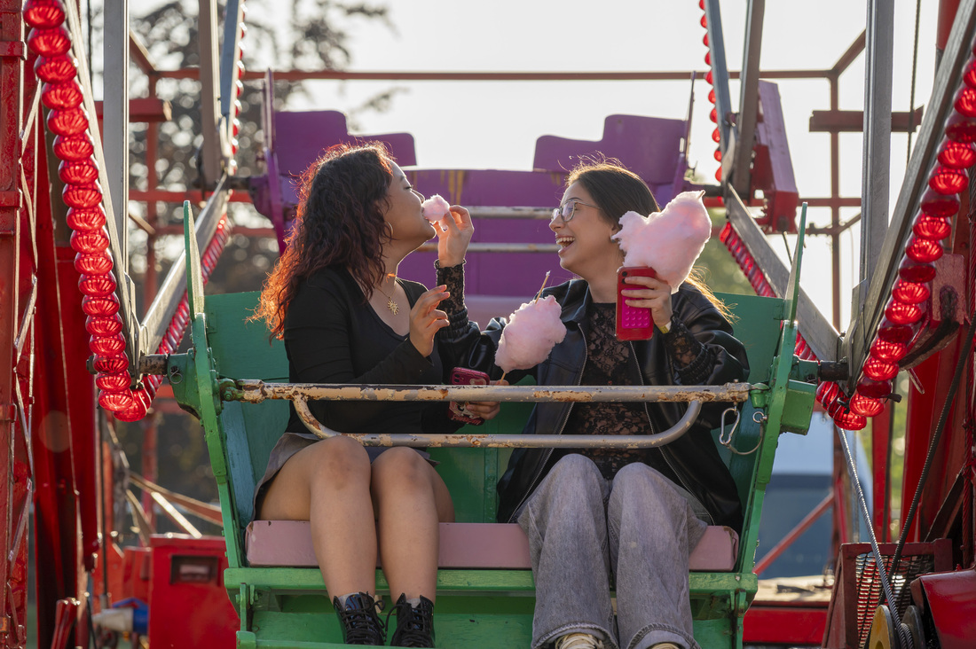 Students sat on a ride at the Summer Ball