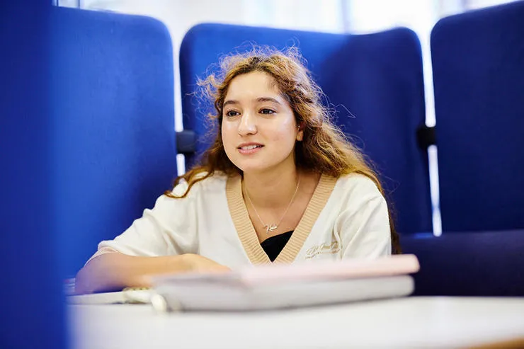 girl sitting and studying