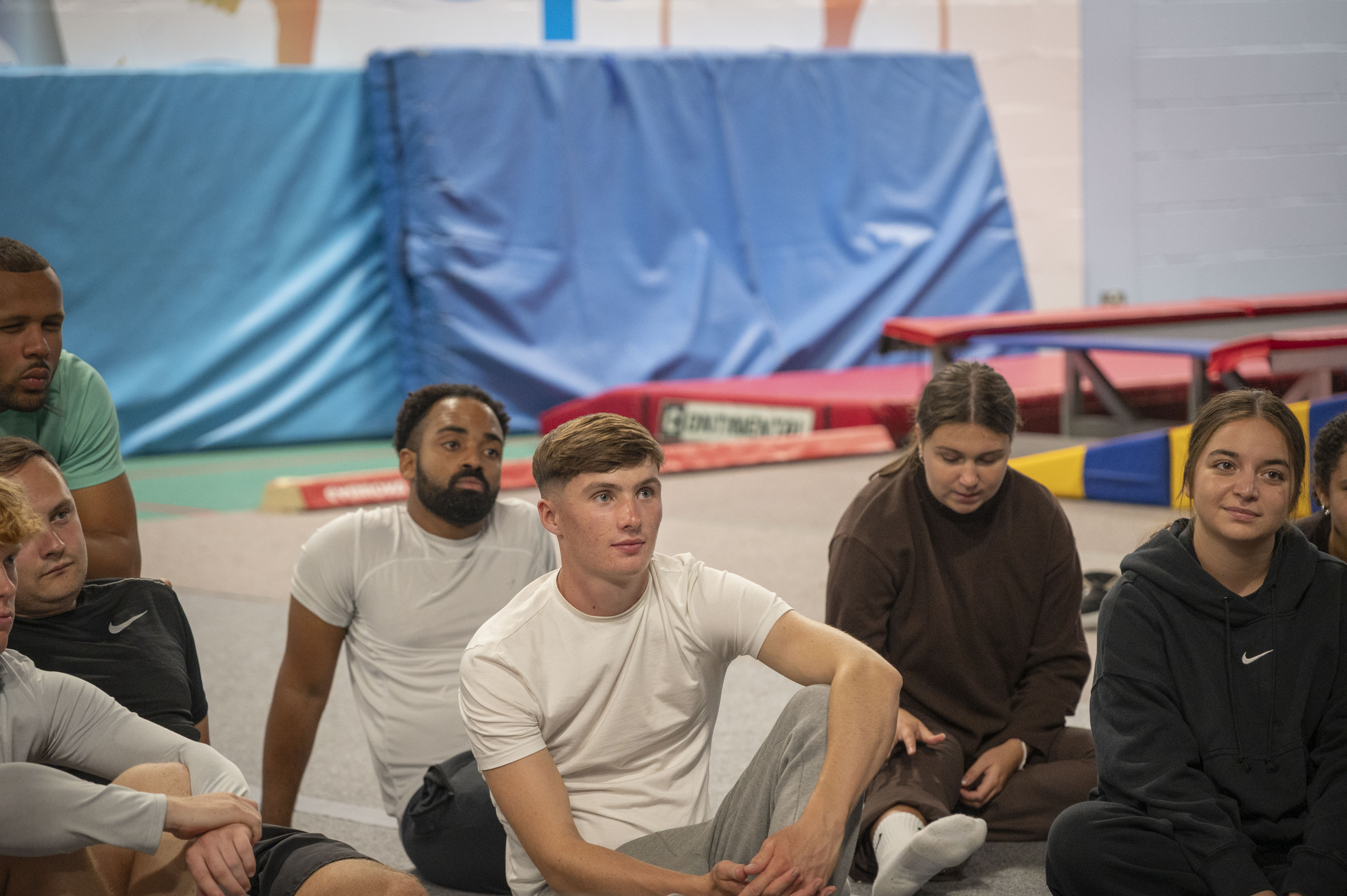 Students listening carefully during a practical lesson on a sports degree course at St Mary's