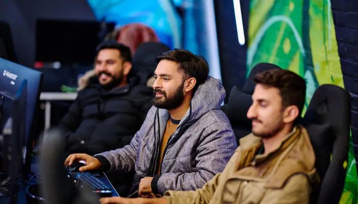group of students playing in esports arena