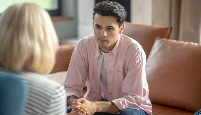 Man in counselling session