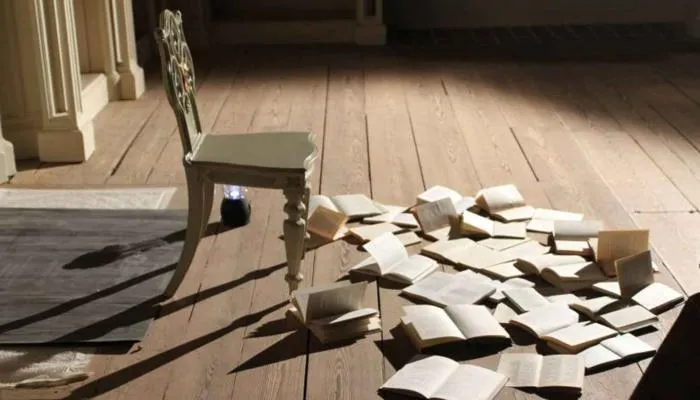 A chair and books