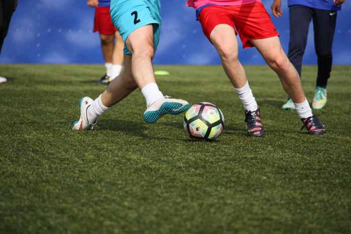 People playing football