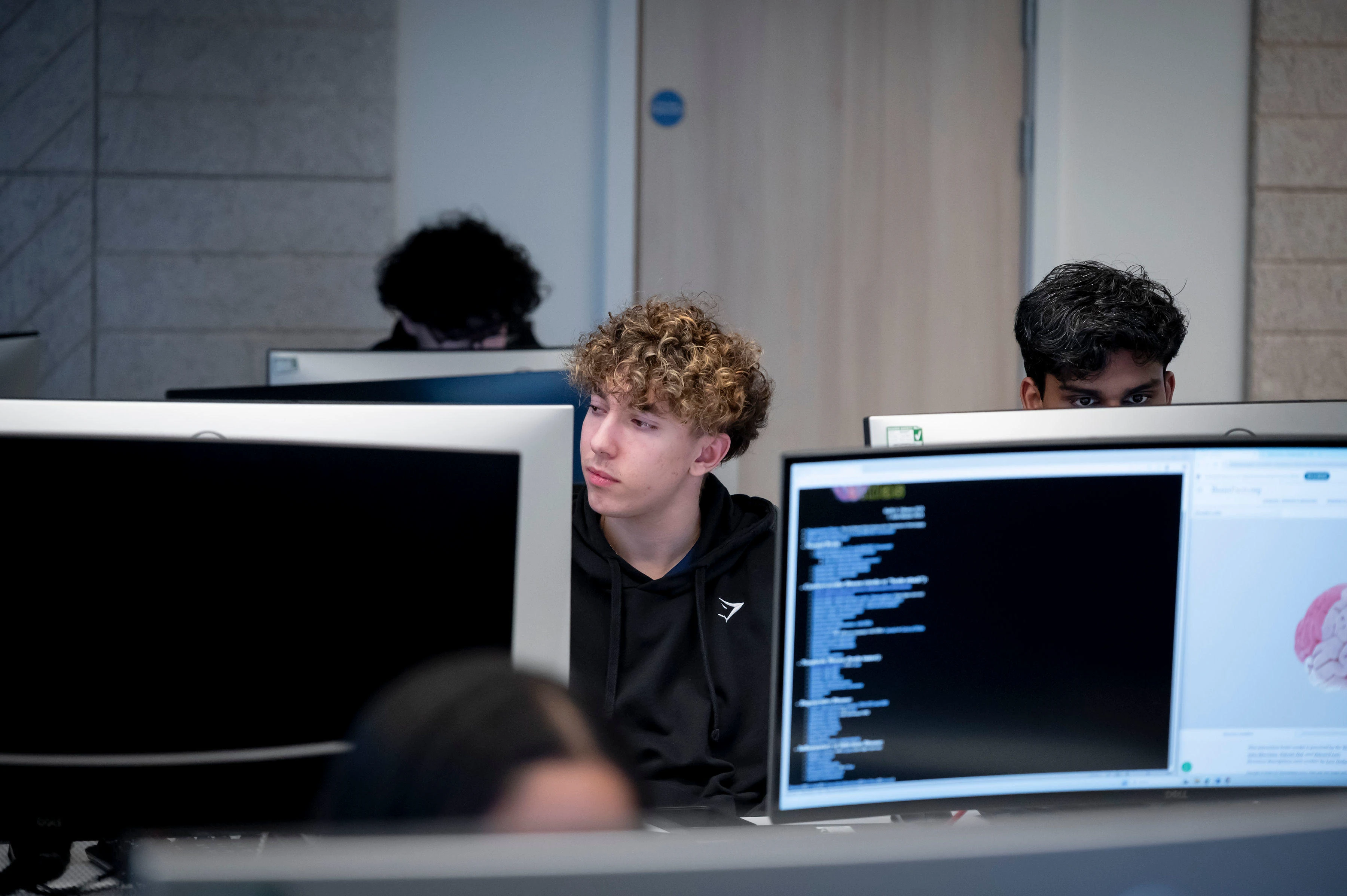 male psychology student in computer room