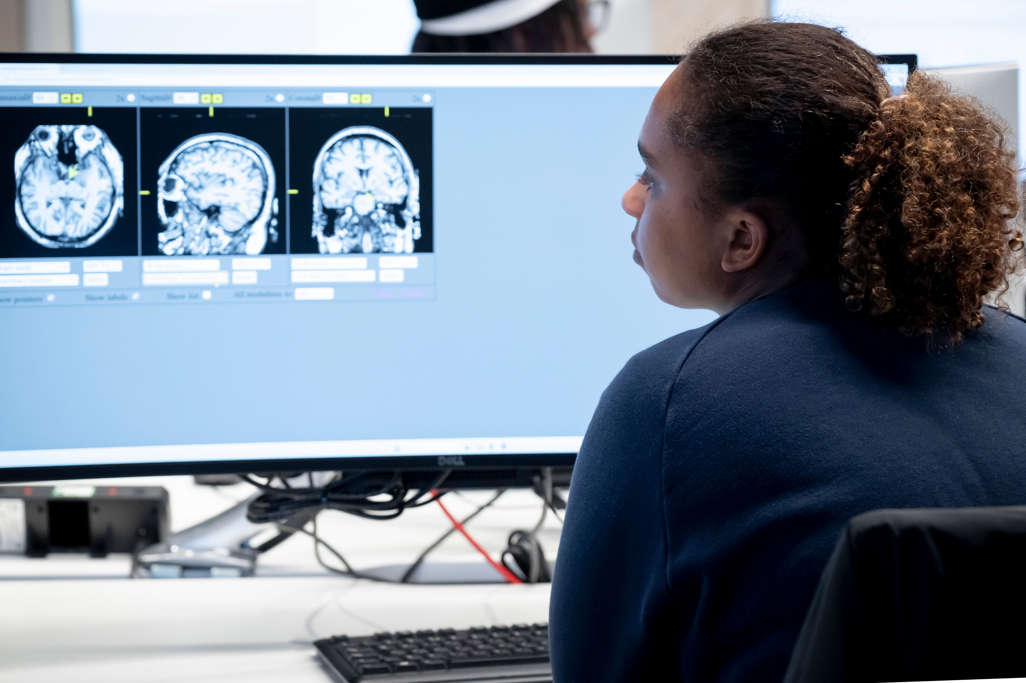 female psychology student looking at computer screen