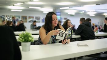 Person reading a book