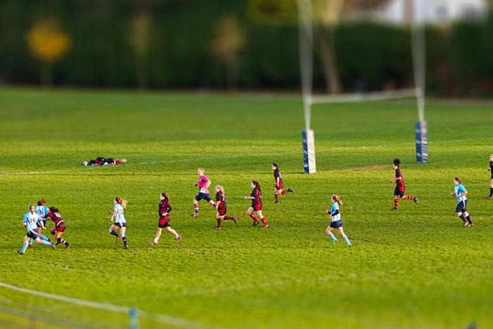 People playing rugby on the pitch