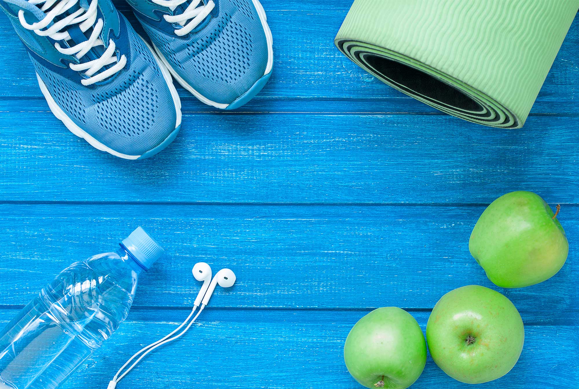 Sports trainers, fruit and exercise equipment