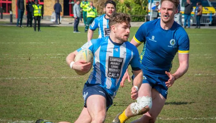 People playing Rugby
