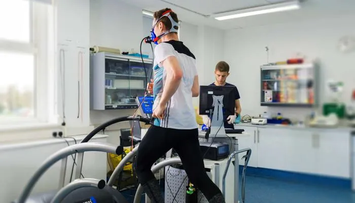 Man running on a treadmill in the exercise psychology laboratory