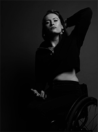 Black and White photo of Olivia Galagher in wheelchair