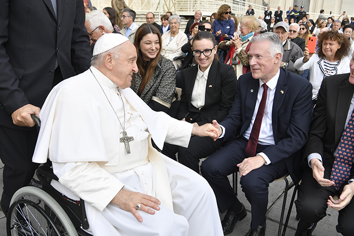 Pope Francis shaking Anthony McClaran's hand in St Peter's Square