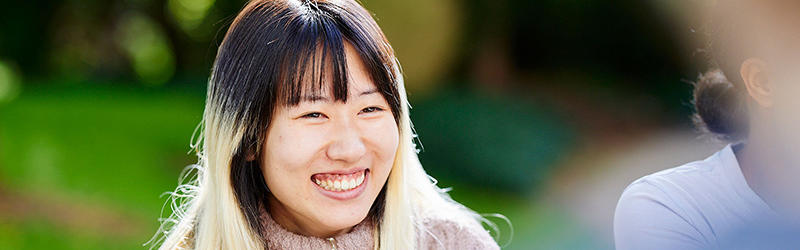 A student smiling.
