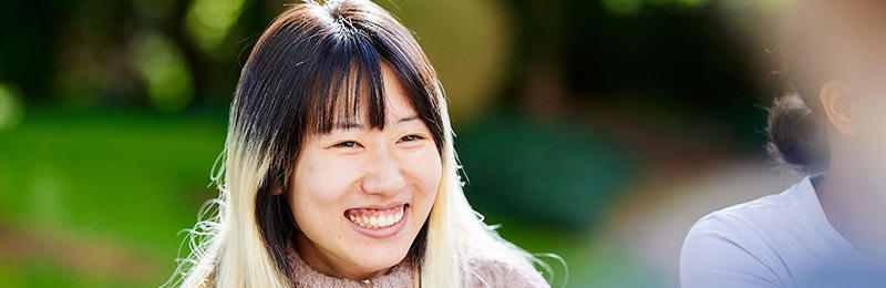 A student smiling