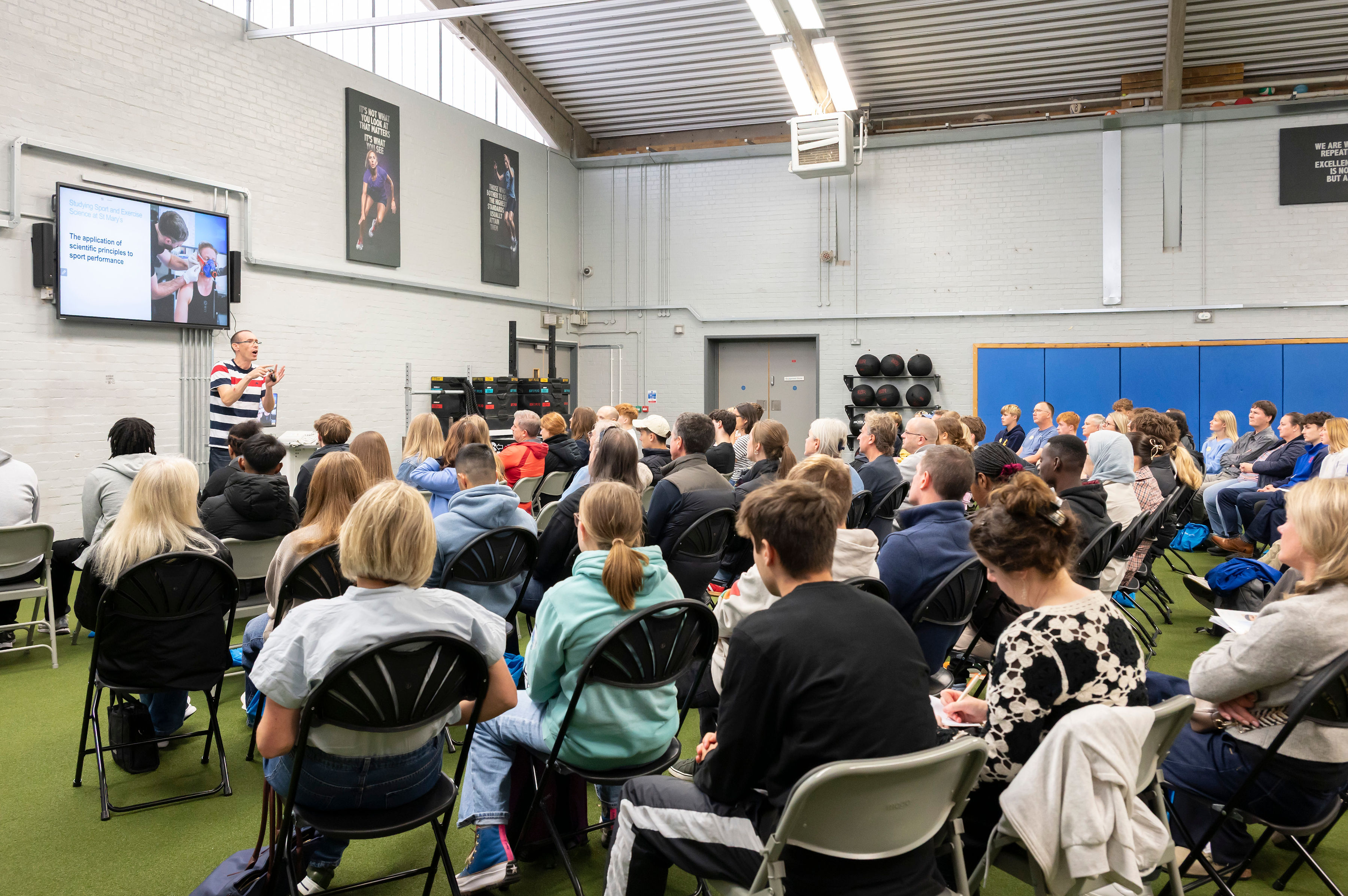 A tutor gives a talk to a room of prospective students during an Open Day at St Mary's University, London.