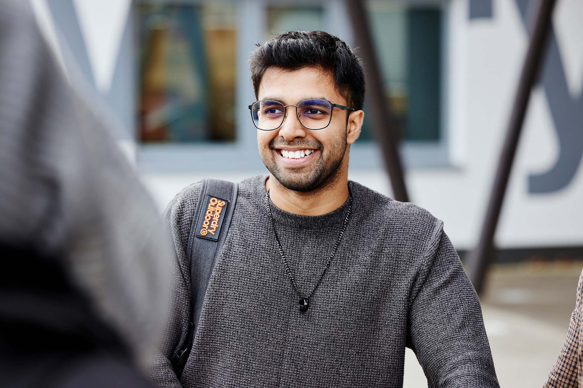 Student talking to friends outside