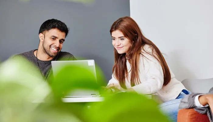 Students working together on a laptop