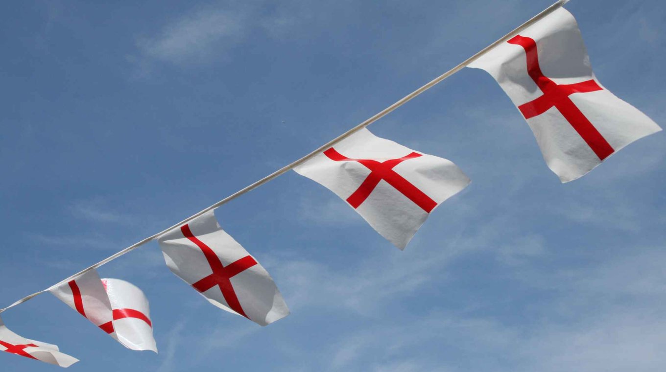 St George's flag bunting across a blue sky on St George's Day.