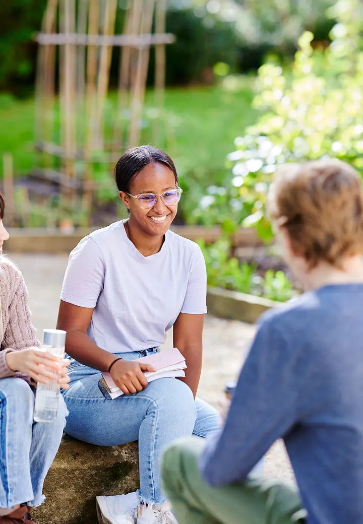 Students by vegetable gardens