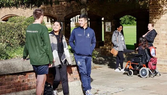 Students socialise on our historic campus.