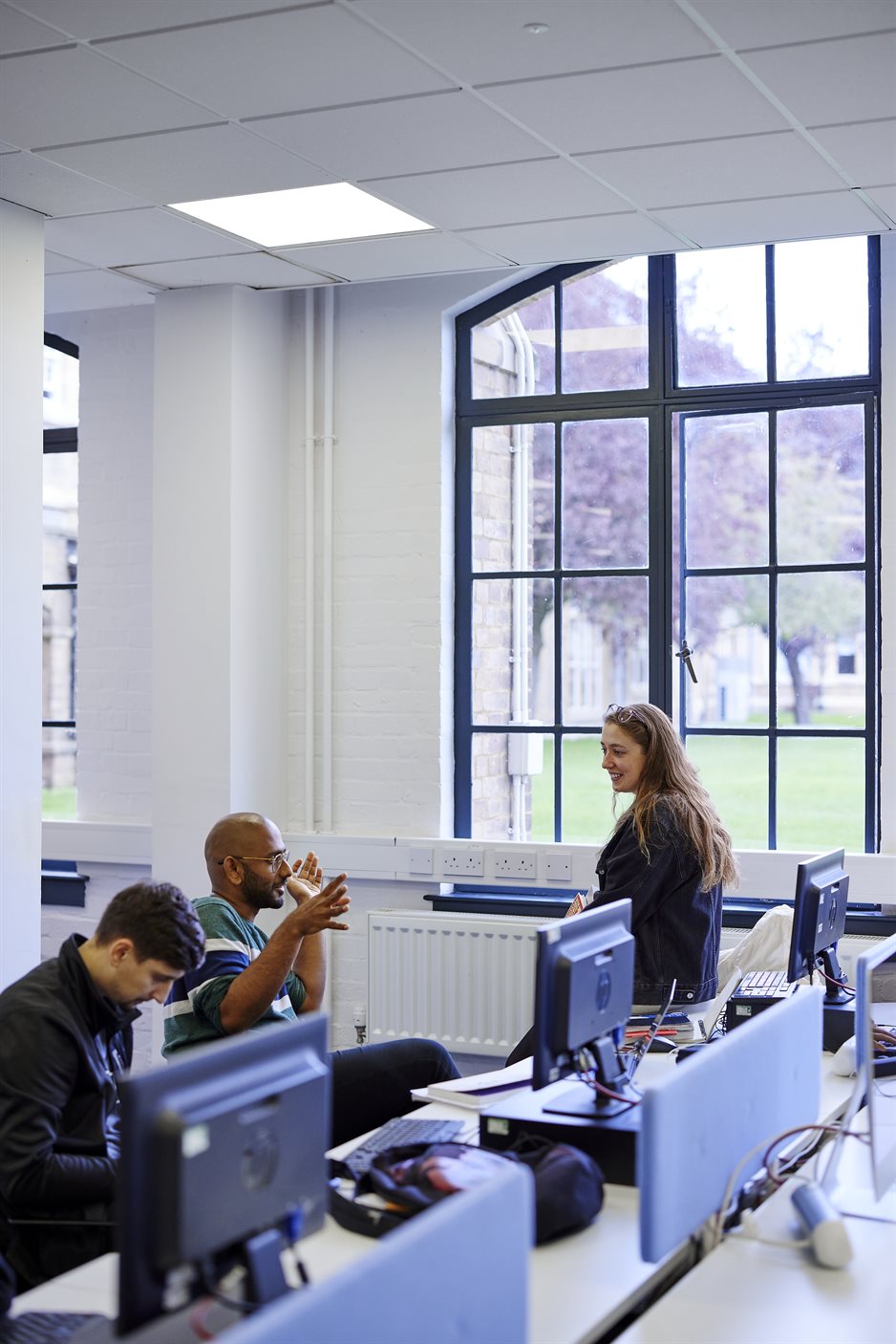 students-chat-computers-cropped-938x1406