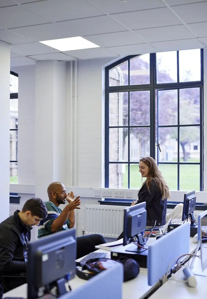 students-chat-computers-cropped-938x1406