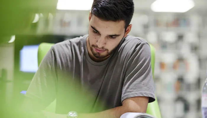 A student reads a book.