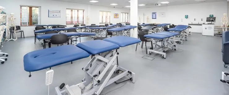Teaching room showing therapy tables at St Mary's dedicated School of Massage.
