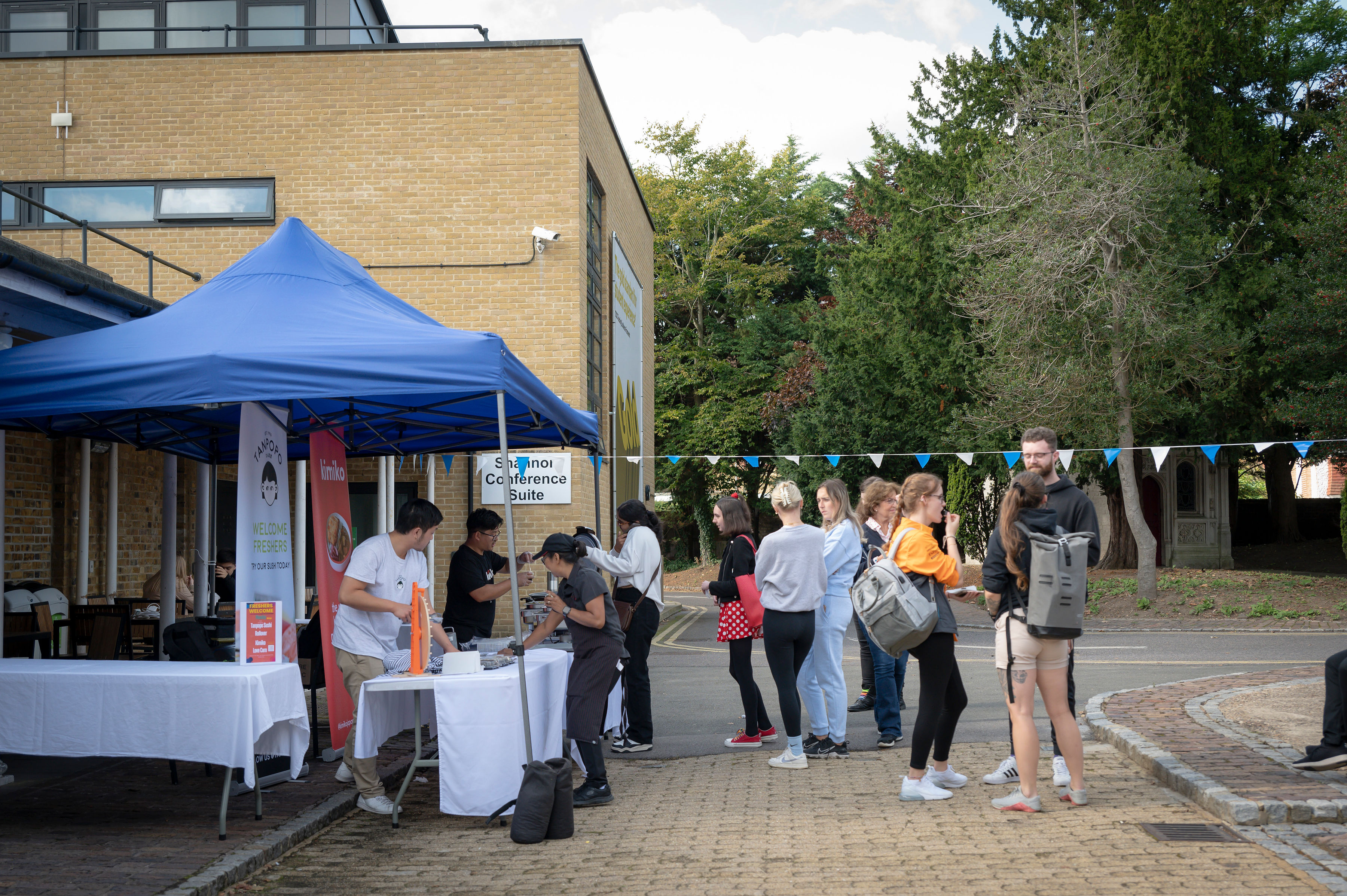 welcome week students queuing at event