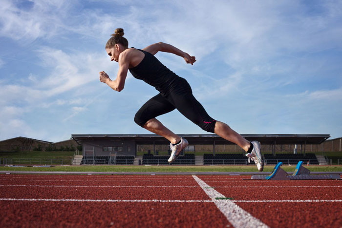 Female athlete on athletics track