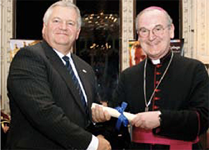 Andy Sutch receives Fellowship from Bishop Stack
