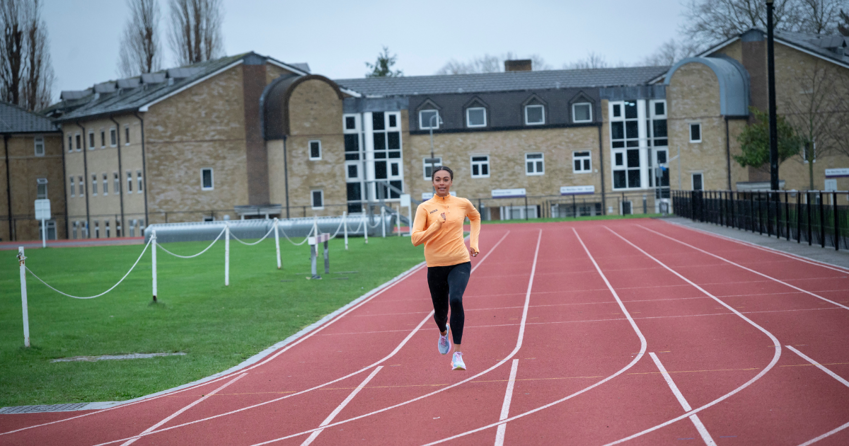 Adelle Tracey running on the track