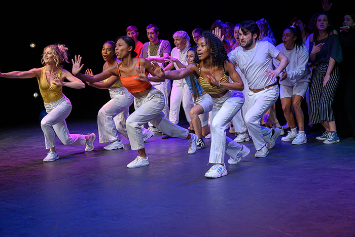 Drama students performing on stage