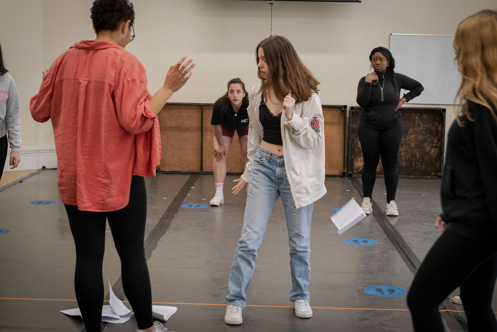 students rehearsing their play