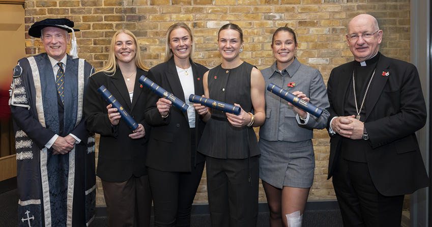 Group photo of Prof Anthony McClaran, Abi Burton, Rosie Galligan, Ellie Kildunne, Jess Breach, Bishop Richard Moth