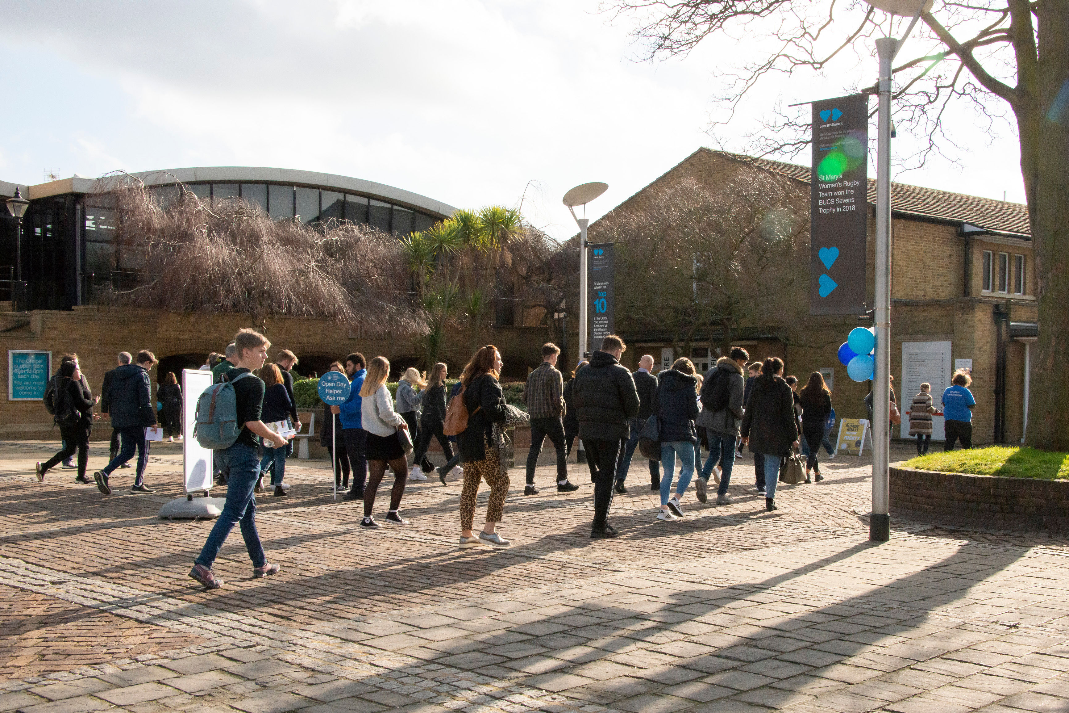 A crowd of visitors arriving to St Mary's University campus for an Open Day