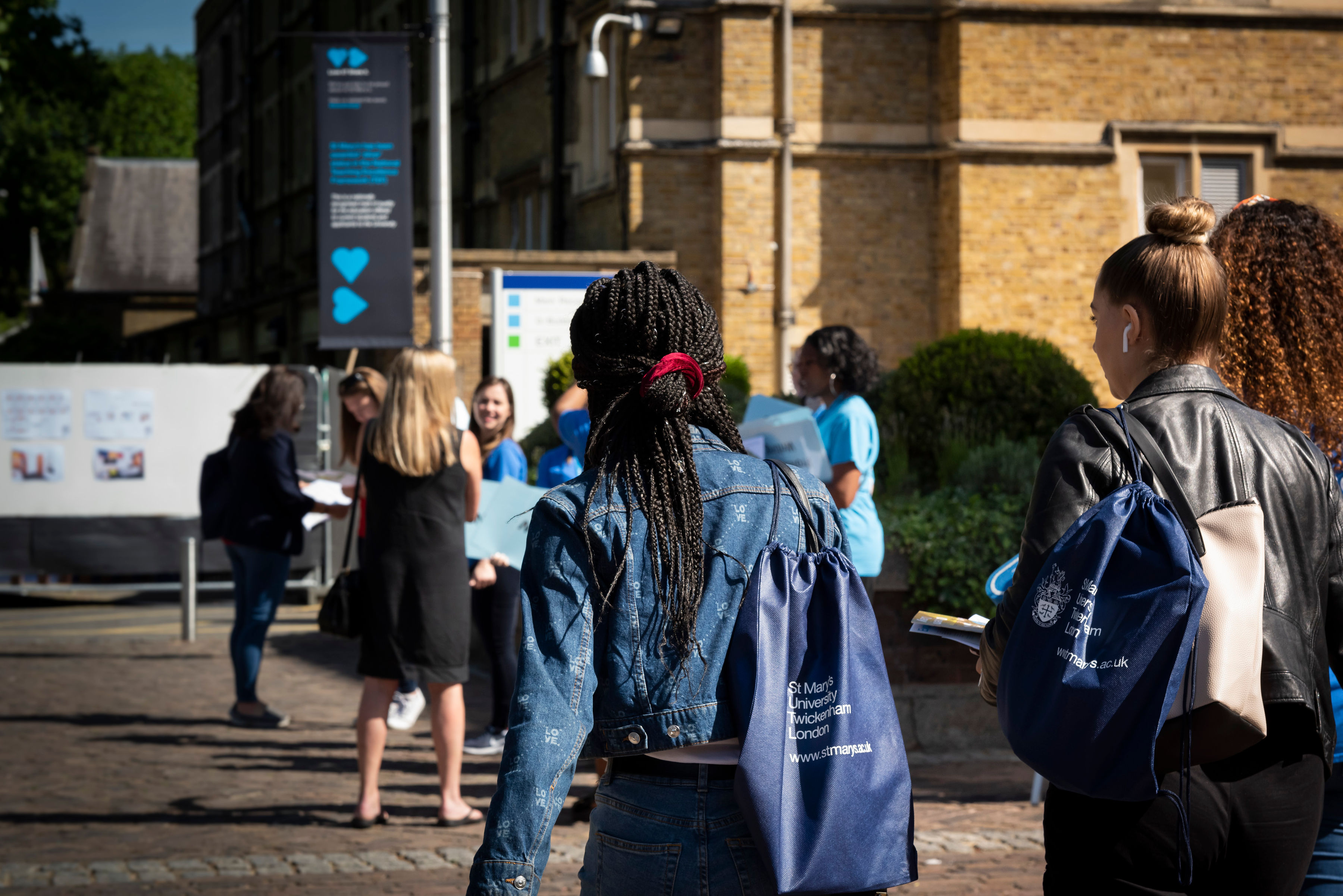 Prospective students gathering for a campus tour at St Mary's University Open Day