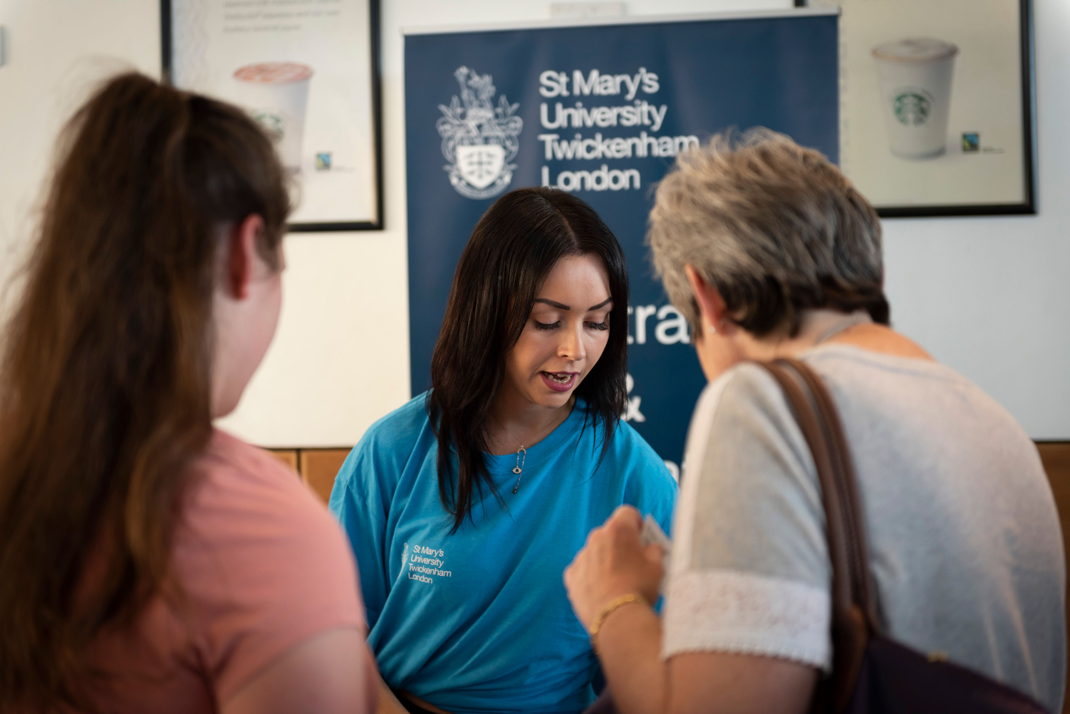 St Mary's University ambassador welcoming Open Day attendees