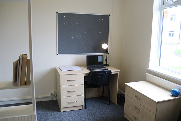 Drawers, shelves and desk in Graham bedroom