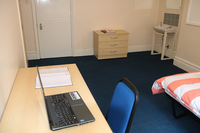 Desk and sink areas in a Waldegrave House single bedroom