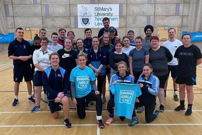 Group photo of the mens and womens cricket teams