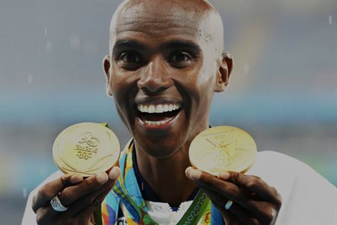 mo-farah-holding-medals